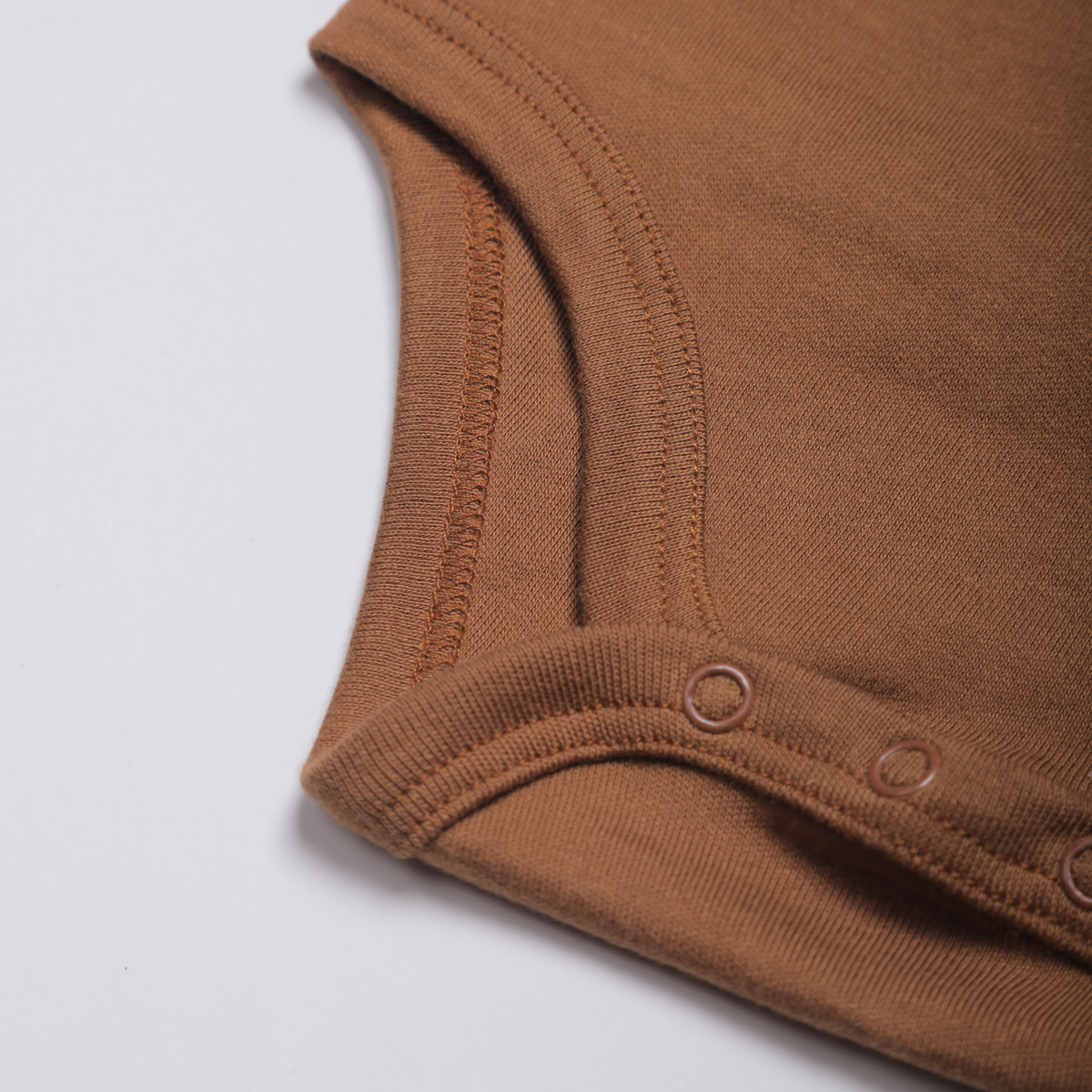 Langærmet babybodystocking