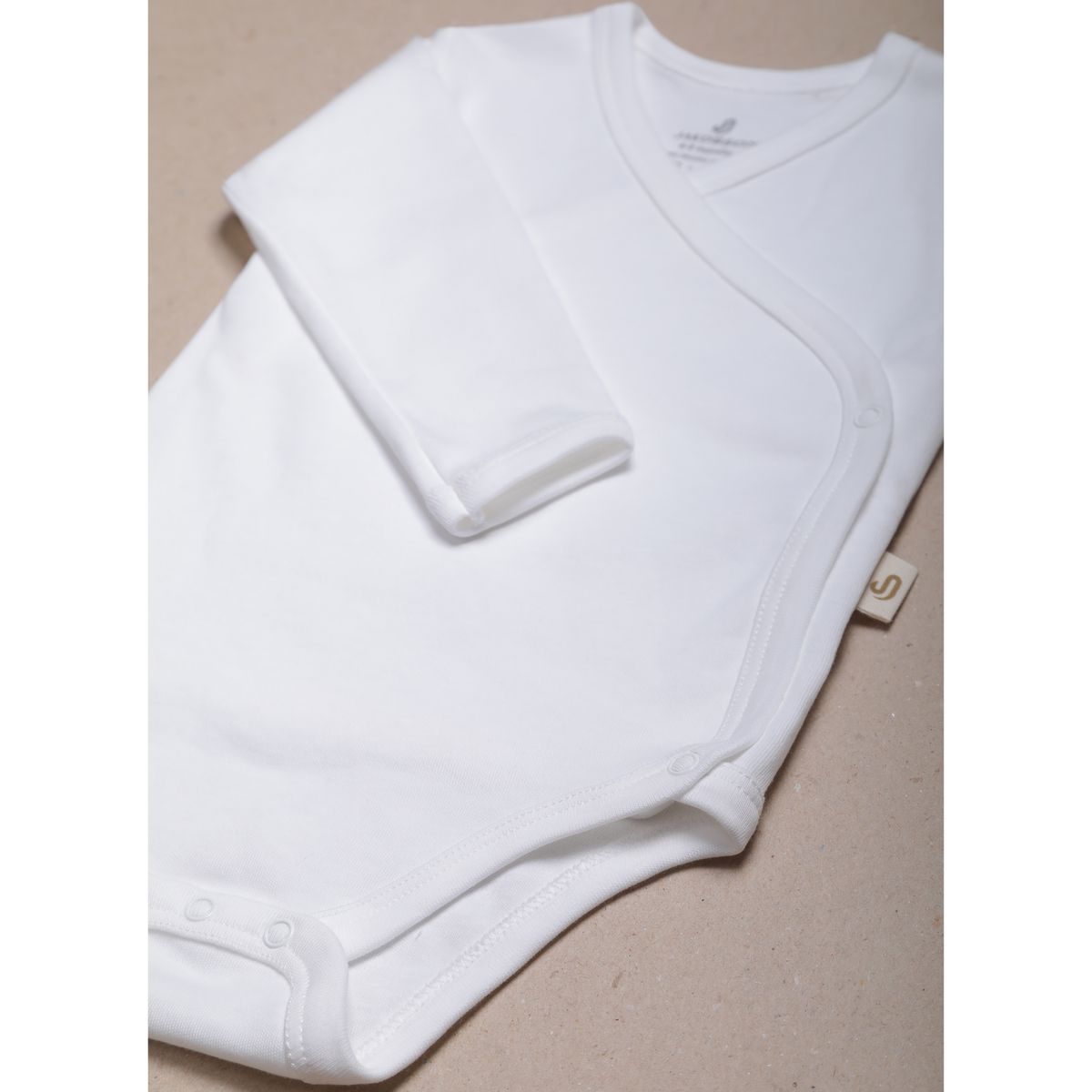 Langærmet babybodystocking
